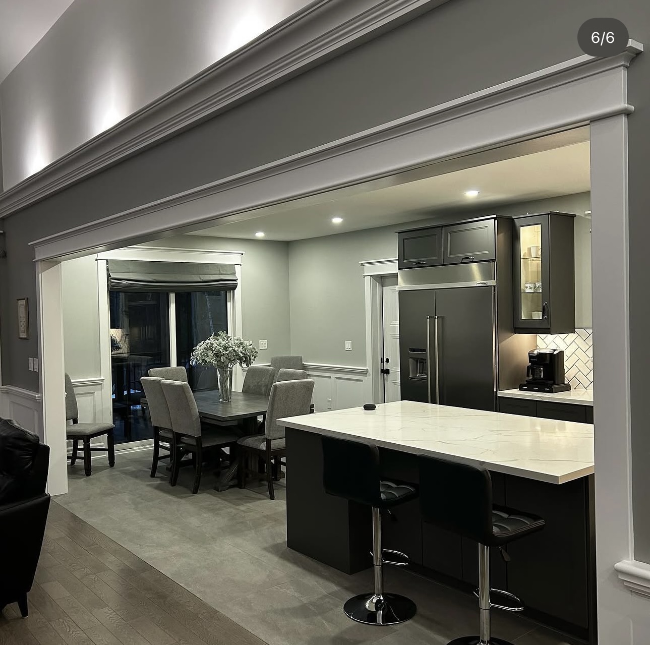 Open-Concept Kitchen and Dining with Crown Moulding